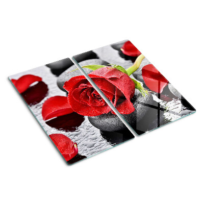 Tagliere in vetro temperato Rosa su pietre con gocce d'acqua