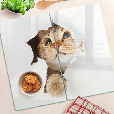 Tagliere in vetro temperato Un gatto che guarda attraverso un buco nel muro