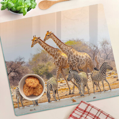 Tagliere in vetro Zebra e giraffa nel loro habitat naturale