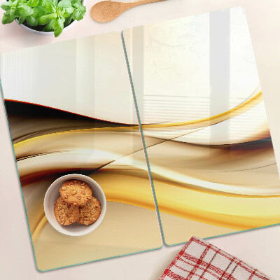 Tagliere in vetro temperato Onde astratte nei toni dell'oro