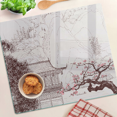Tagliere in vetro temperato Paesaggio montano con alberi in fiore