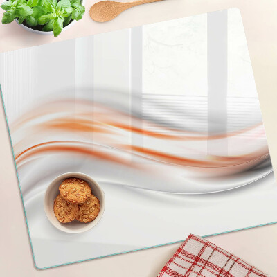 Tagliere in vetro Onde nei toni dell'arancione e del grigio