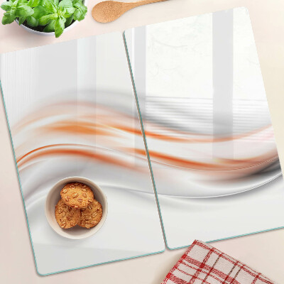 Tagliere in vetro Onde nei toni dell'arancione e del grigio
