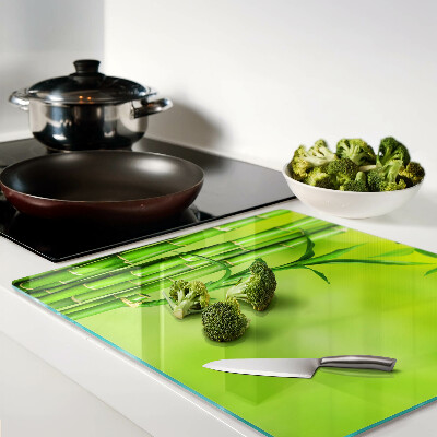 Tagliere in vetro Bambù su sfondo verde