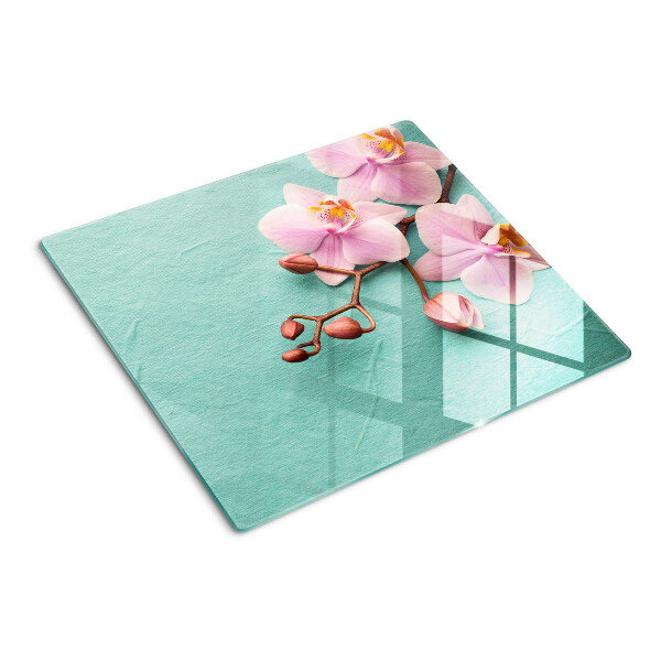 Tagliere in vetro temperato Orchidee su sfondo blu