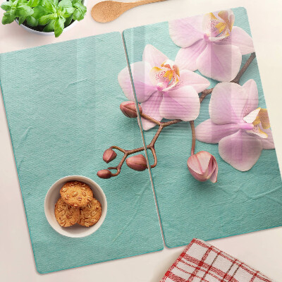 Tagliere in vetro temperato Orchidee su sfondo blu