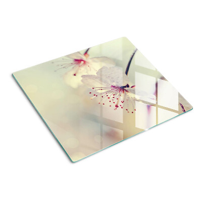 Tagliere in vetro temperato Fiori su sfondo geometrico