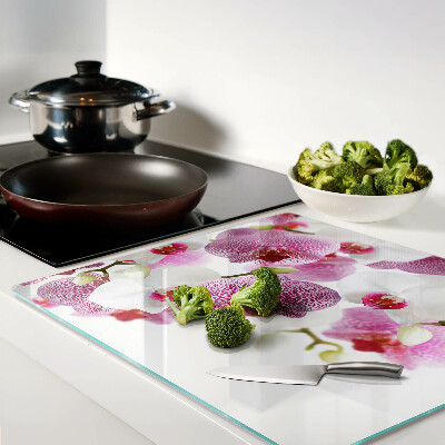 Tagliere in vetro Orchidee davanti alla finestra