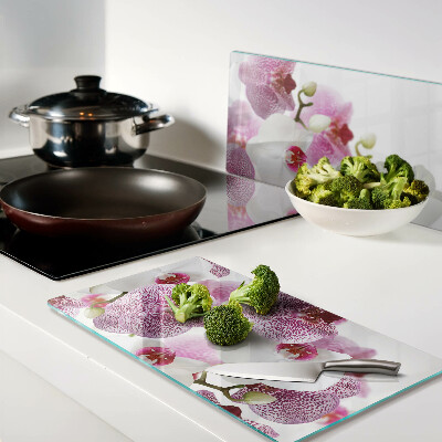 Tagliere in vetro Orchidee davanti alla finestra
