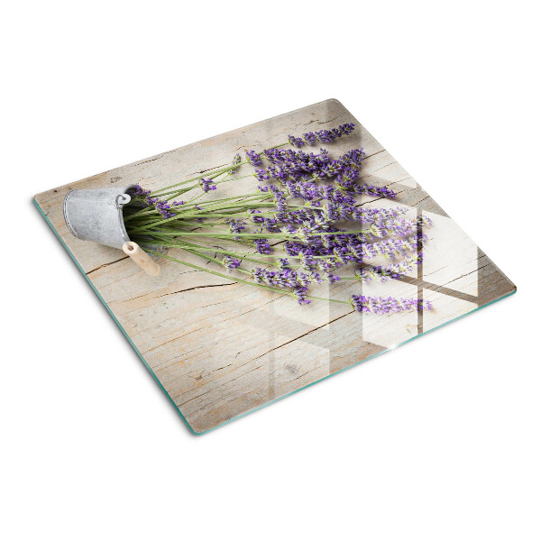 Tagliere in vetro Lavanda in vaso su fondo in legno