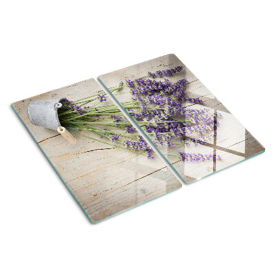 Tagliere in vetro Lavanda in vaso su fondo in legno