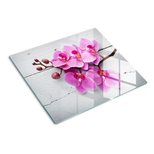Tagliere in vetro Orchidee su sfondo bianco