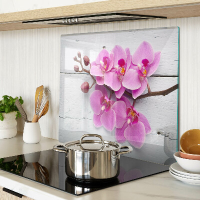 Tagliere in vetro Orchidee su sfondo bianco