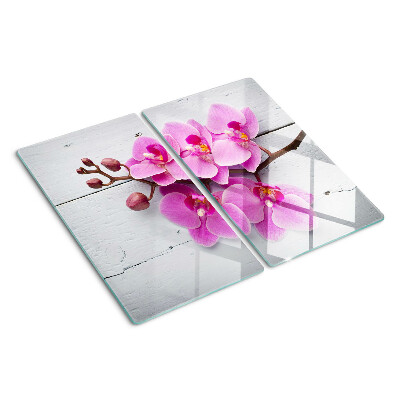 Tagliere in vetro Orchidee su sfondo bianco