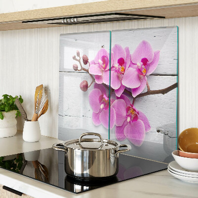 Tagliere in vetro Orchidee su sfondo bianco