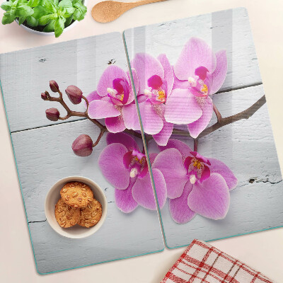 Tagliere in vetro Orchidee su sfondo bianco