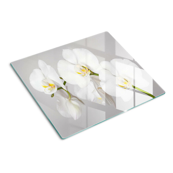 Tagliere in vetro Orchidee su sfondo a specchio