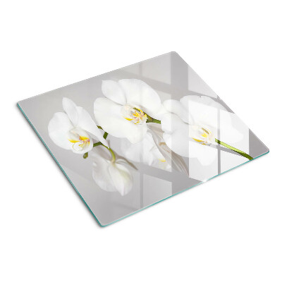 Tagliere in vetro Orchidee su sfondo a specchio