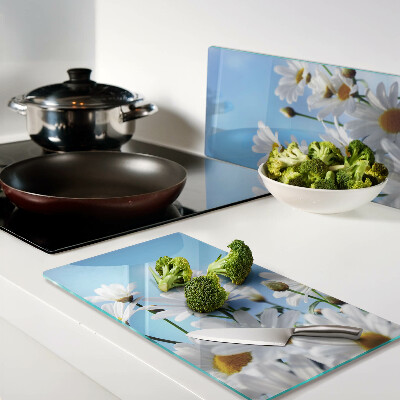 Tagliere in vetro temperato Fiori di margherita su sfondo blu