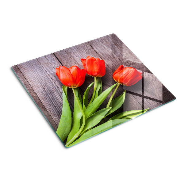 Tagliere in vetro Tulipani su uno sfondo di legno