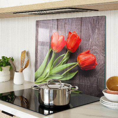Tagliere in vetro Tulipani su uno sfondo di legno