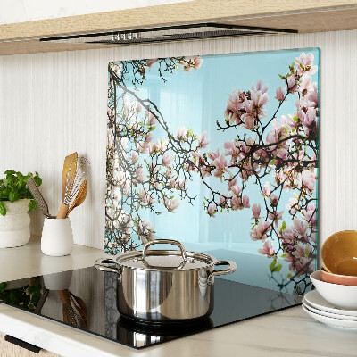 Tagliere in vetro temperato Fiori di magnolia su sfondo blu