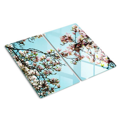 Tagliere in vetro temperato Fiori di magnolia su sfondo blu