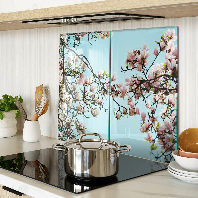 Tagliere in vetro temperato Fiori di magnolia su sfondo blu