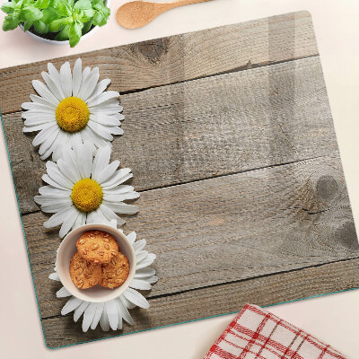 Tagliere in vetro Fiori su uno sfondo di legno