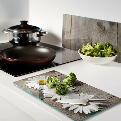 Tagliere in vetro Fiori su uno sfondo di legno