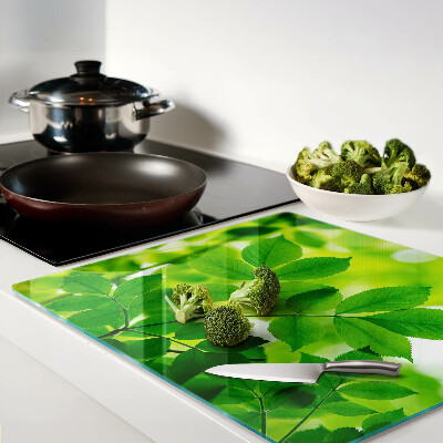 Tagliere in vetro Foglie su sfondo verde