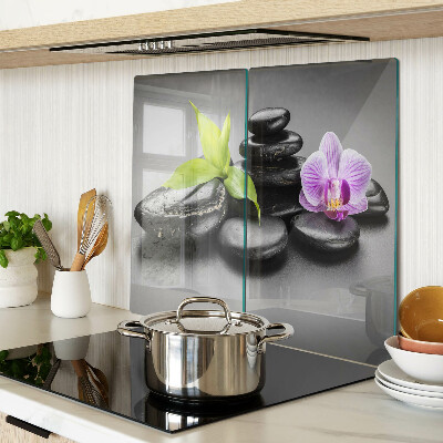 Tagliere in vetro temperato Pietre e orchidea sullo sfondo