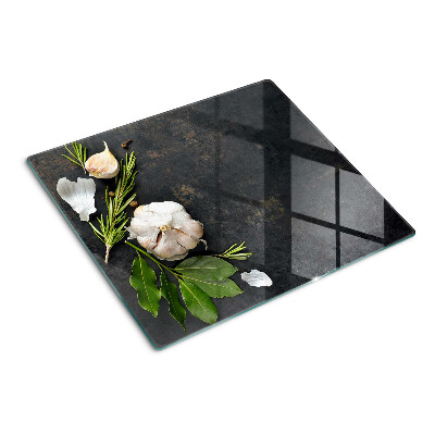 Tagliere in vetro Fiori ed erbe su uno sfondo di marmo