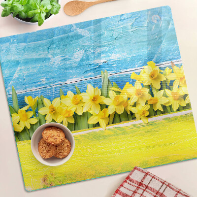 Tagliere in vetro temperato Fiori di narciso contro il cielo