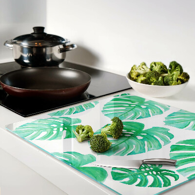 Tagliere in vetro temperato Foglie di Monstera su sfondo bianco