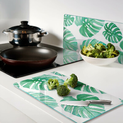 Tagliere in vetro temperato Foglie di Monstera su sfondo bianco