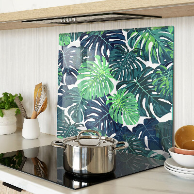 Tagliere in vetro temperato Foglie di monstera su uno sfondo tropicale
