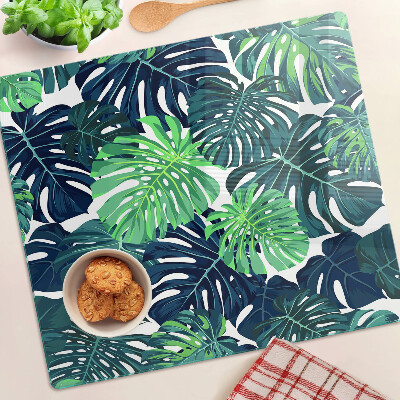 Tagliere in vetro temperato Foglie di monstera su uno sfondo tropicale