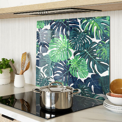 Tagliere in vetro temperato Foglie di monstera su uno sfondo tropicale