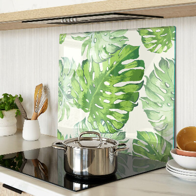 Tagliere in vetro temperato Foglie di Monstera su uno sfondo chiaro