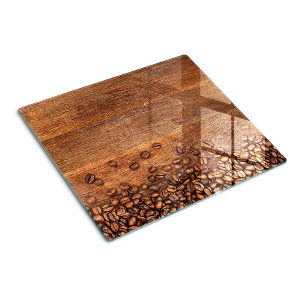 Tagliere in vetro Chicchi di caffè su sfondo di legno