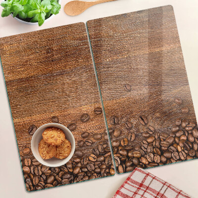Tagliere in vetro Chicchi di caffè su sfondo di legno