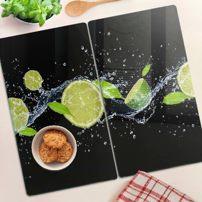 Tagliere in vetro Limoni in acqua con foglie di menta