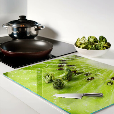 Tagliere in vetro Kiwi con gocce d'acqua