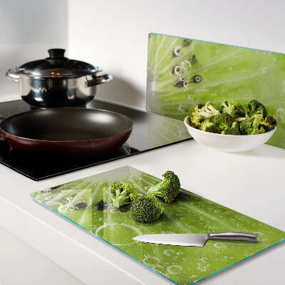 Tagliere in vetro Kiwi con gocce d'acqua