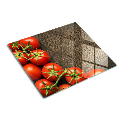 Tagliere in vetro Pomodori su uno sfondo di legno