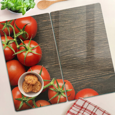 Tagliere in vetro Pomodori su uno sfondo di legno