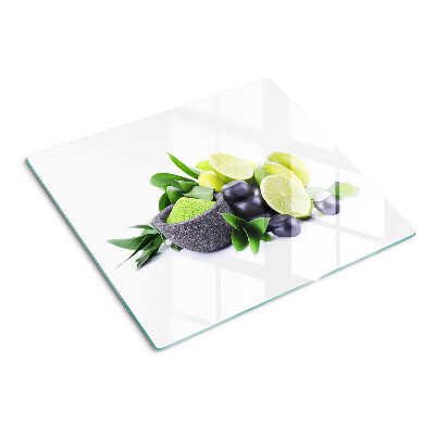 Tagliere in vetro Limoni e uva su sfondo verde