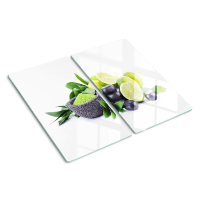 Tagliere in vetro Limoni e uva su sfondo verde