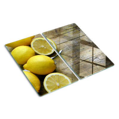 Tagliere in vetro Limoni su uno sfondo di legno